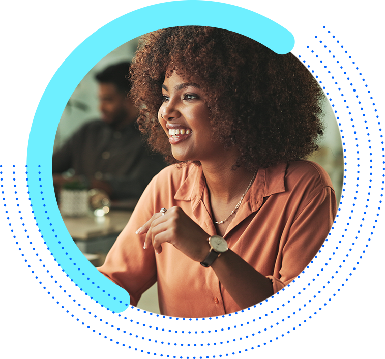 total-ip-inset happy marketer looking at her computer screen