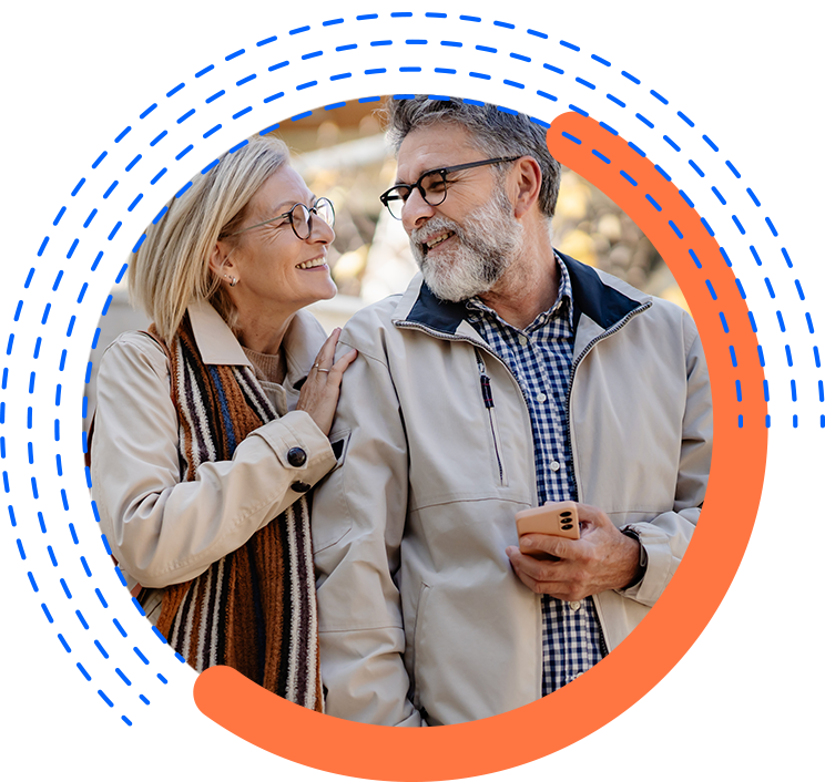 vms-total-consumer-history-inset Smiling Senior Couple with Cel Phone